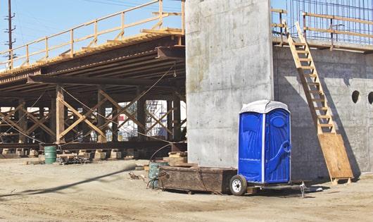 a necessary and important addition to any job site - porta potties for workers' comfort