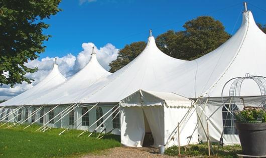 high-quality portable restrooms stationed at a wedding, meeting the needs of guests throughout the outdoor reception in Denair